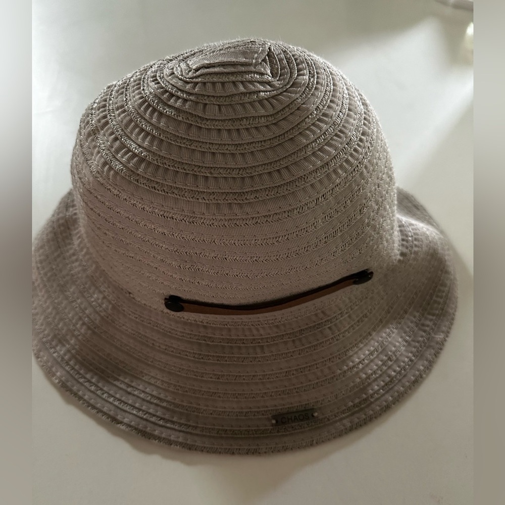 Cloche style hat with leather detail. Worn once. Packable lightweight poly blend